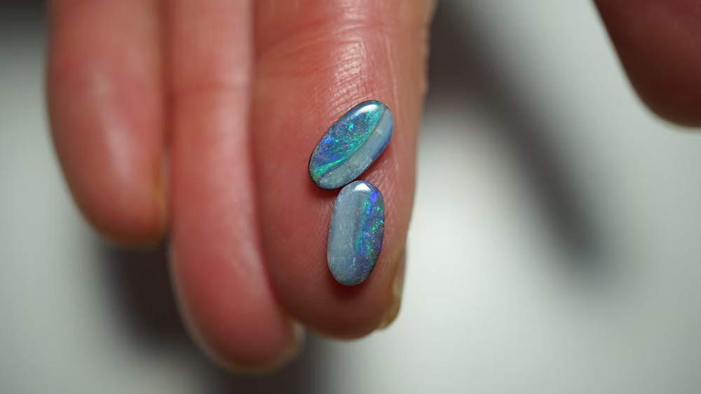 2.2ct Matched Boulder Opal Pair - Green & Gold Pinfire on Mid Blue Host Body Tone