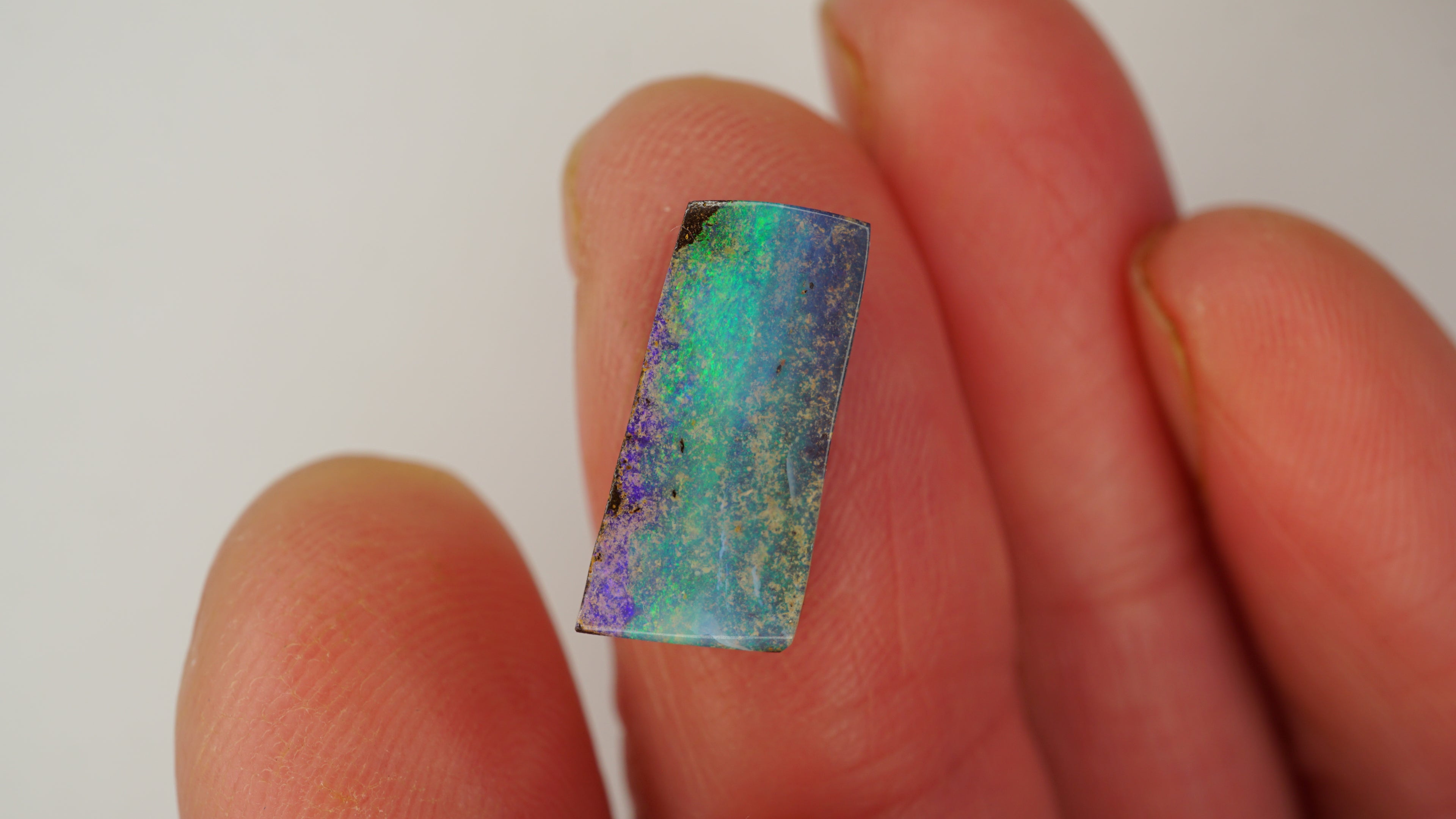 5.8 ct Rectangular Purple Boulder Opal - Green Pinfire Banding
