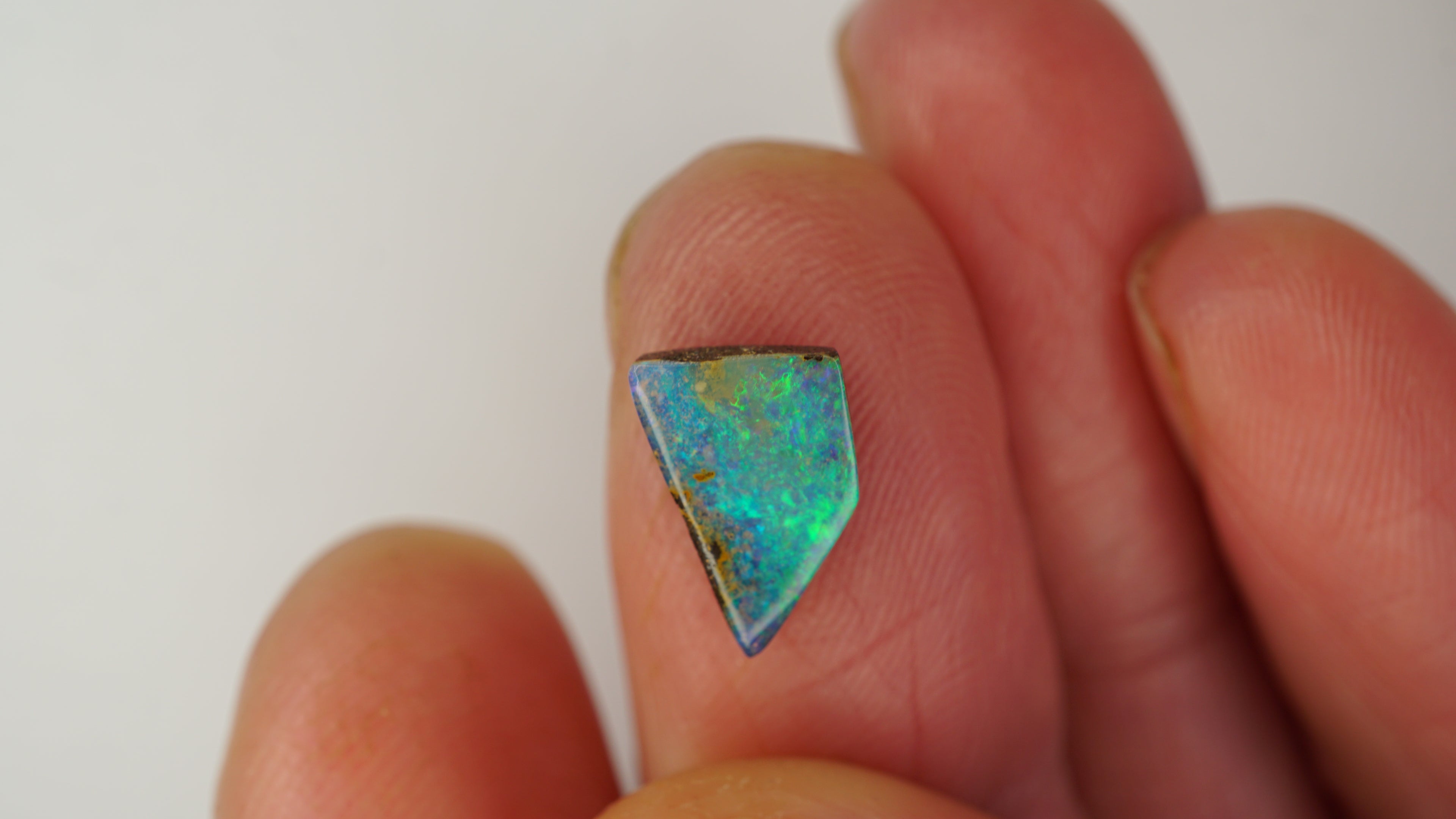 2.0ct Boulder Opal - Electric Green & Blue Pinfire on Green Host Body Tone