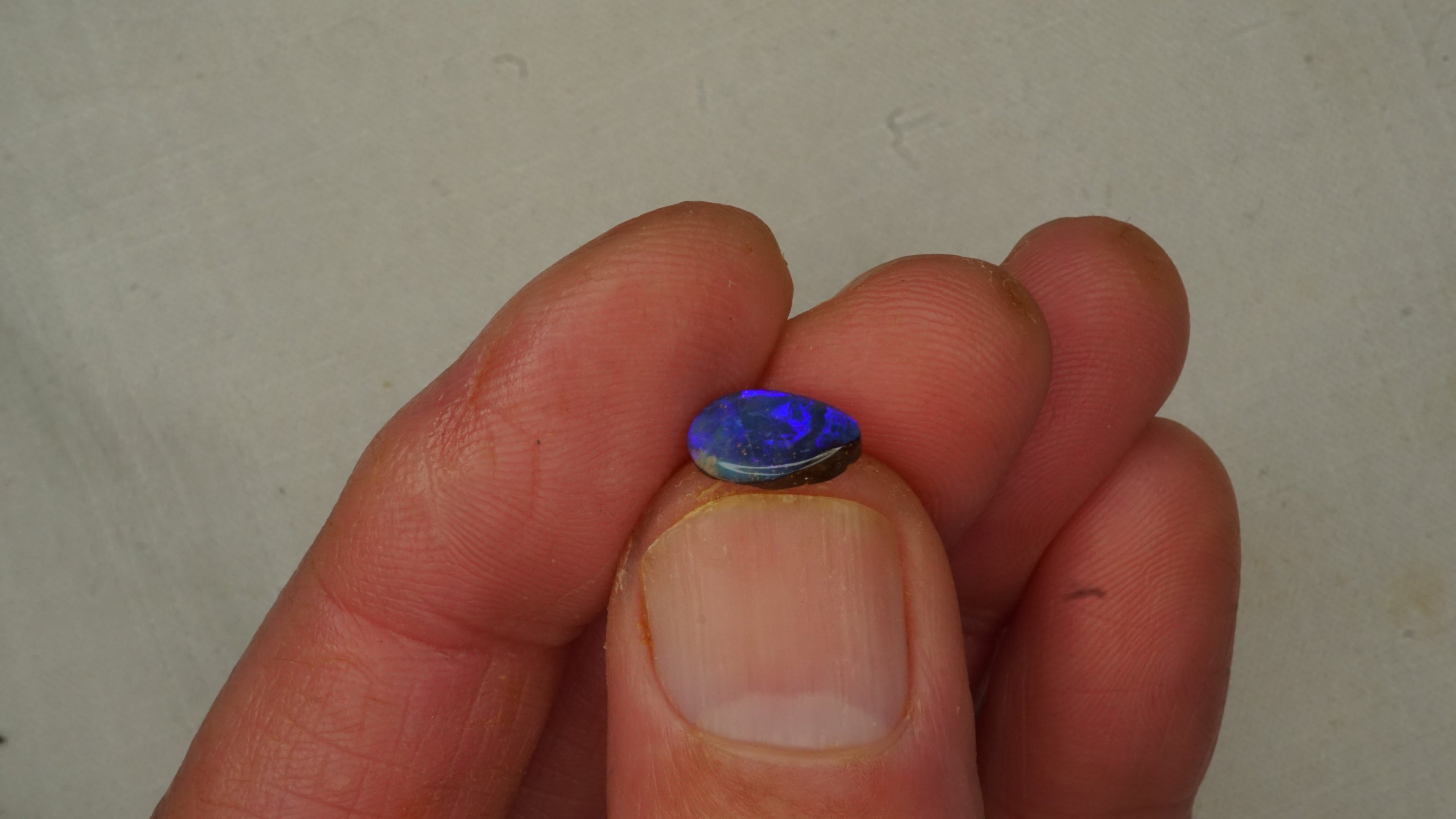 1.1 ct Blue Boulder Opal - Broad Rolling Flash