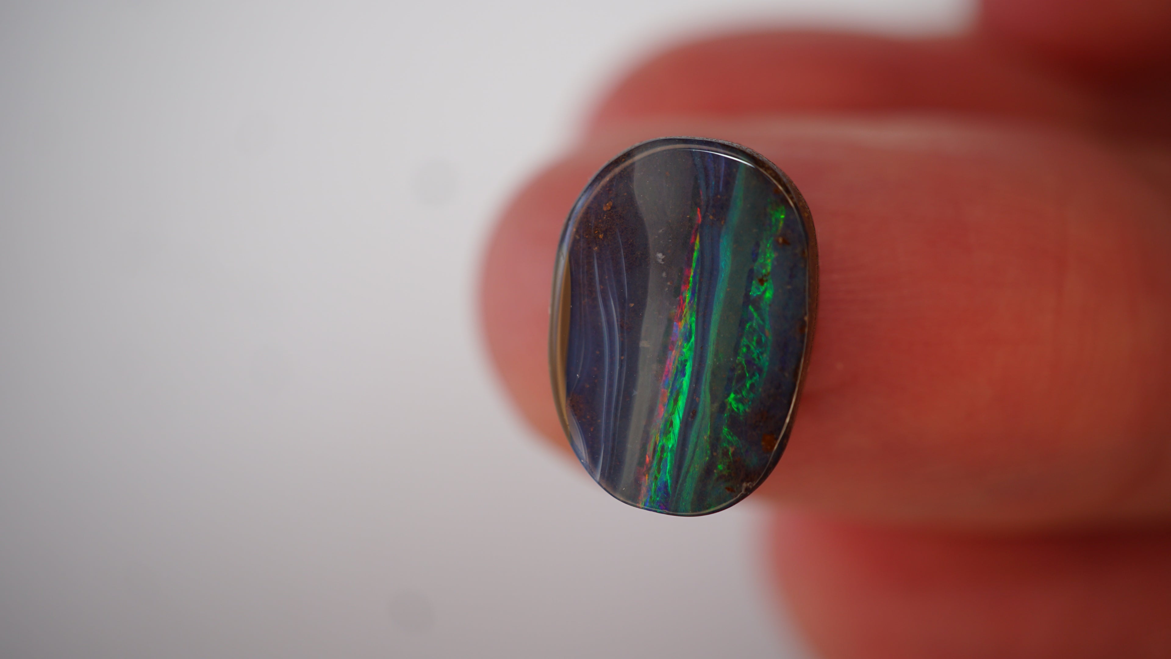 5.4ct Boulder Opal - Neon Green & Crimson Streaks on Blue Host Body Tone
