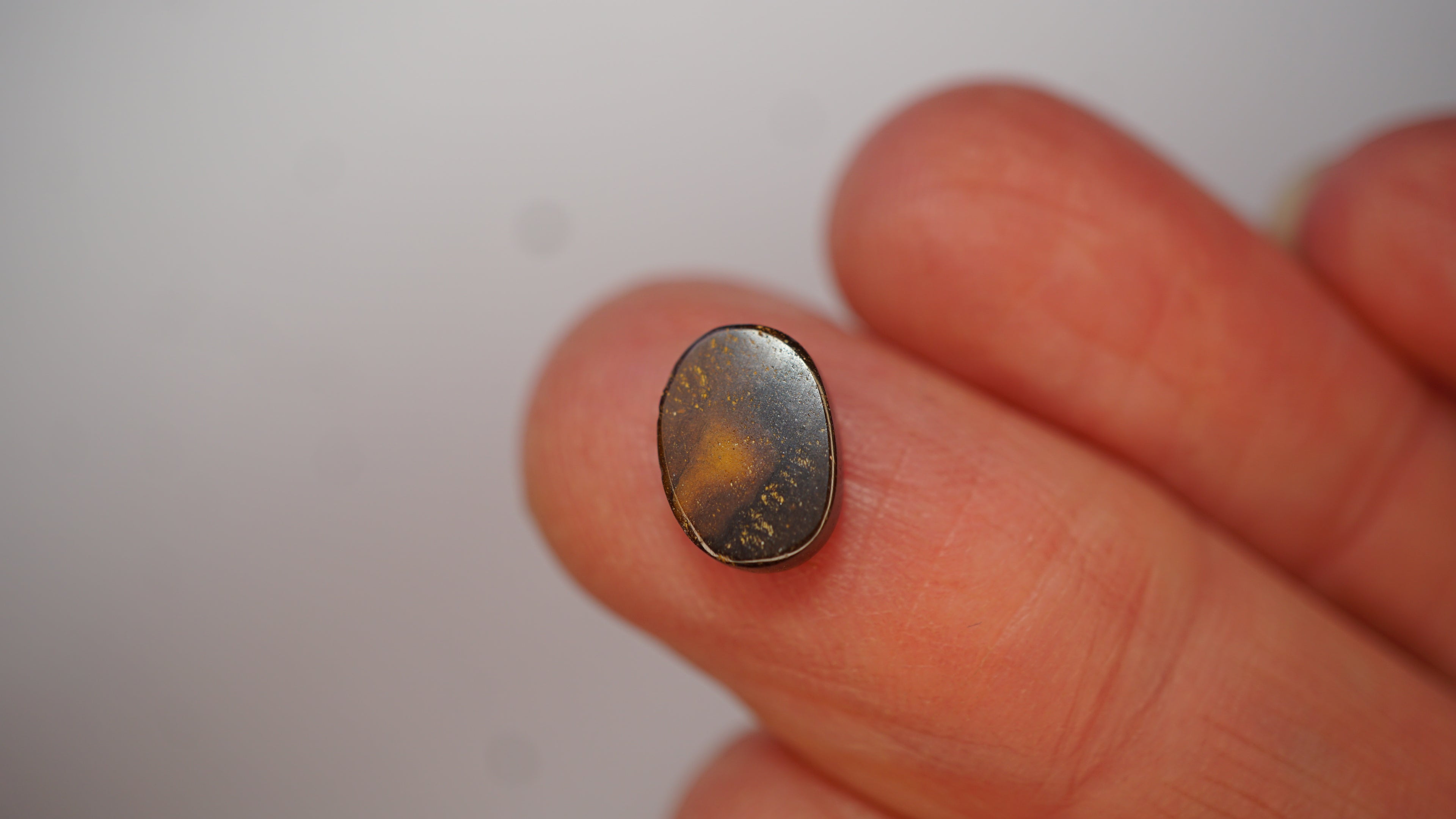 2.3ct Boulder Opal - Crimson Play on Pale Purple Host Body Tone