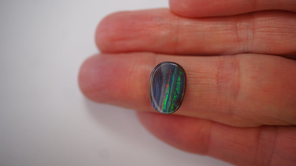5.4ct Boulder Opal - Neon Green & Crimson Streaks on Blue Host Body Tone