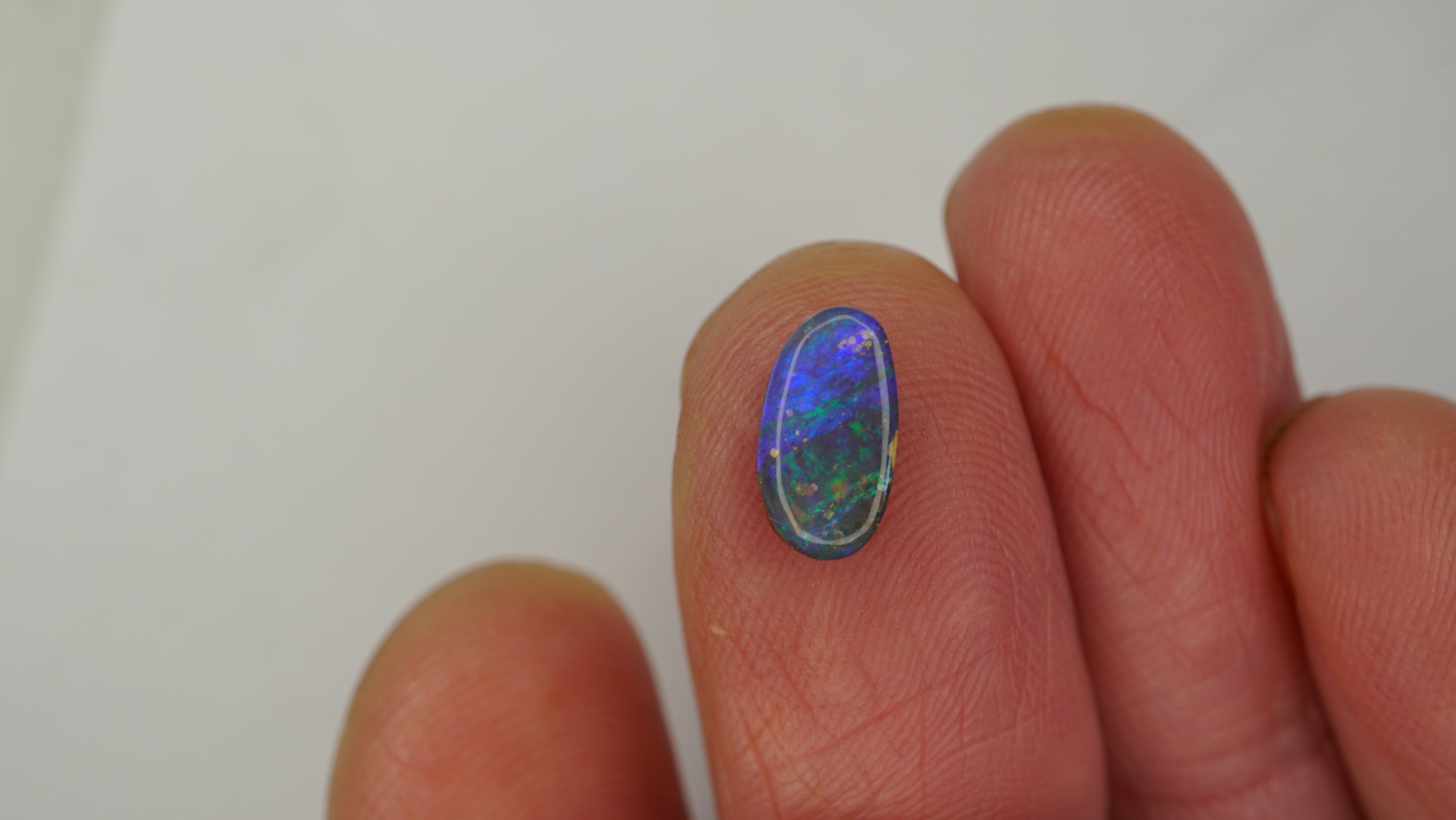 1.3ct Boulder Opal - Electric Green & Blue Fire on Blue Host Body Tone