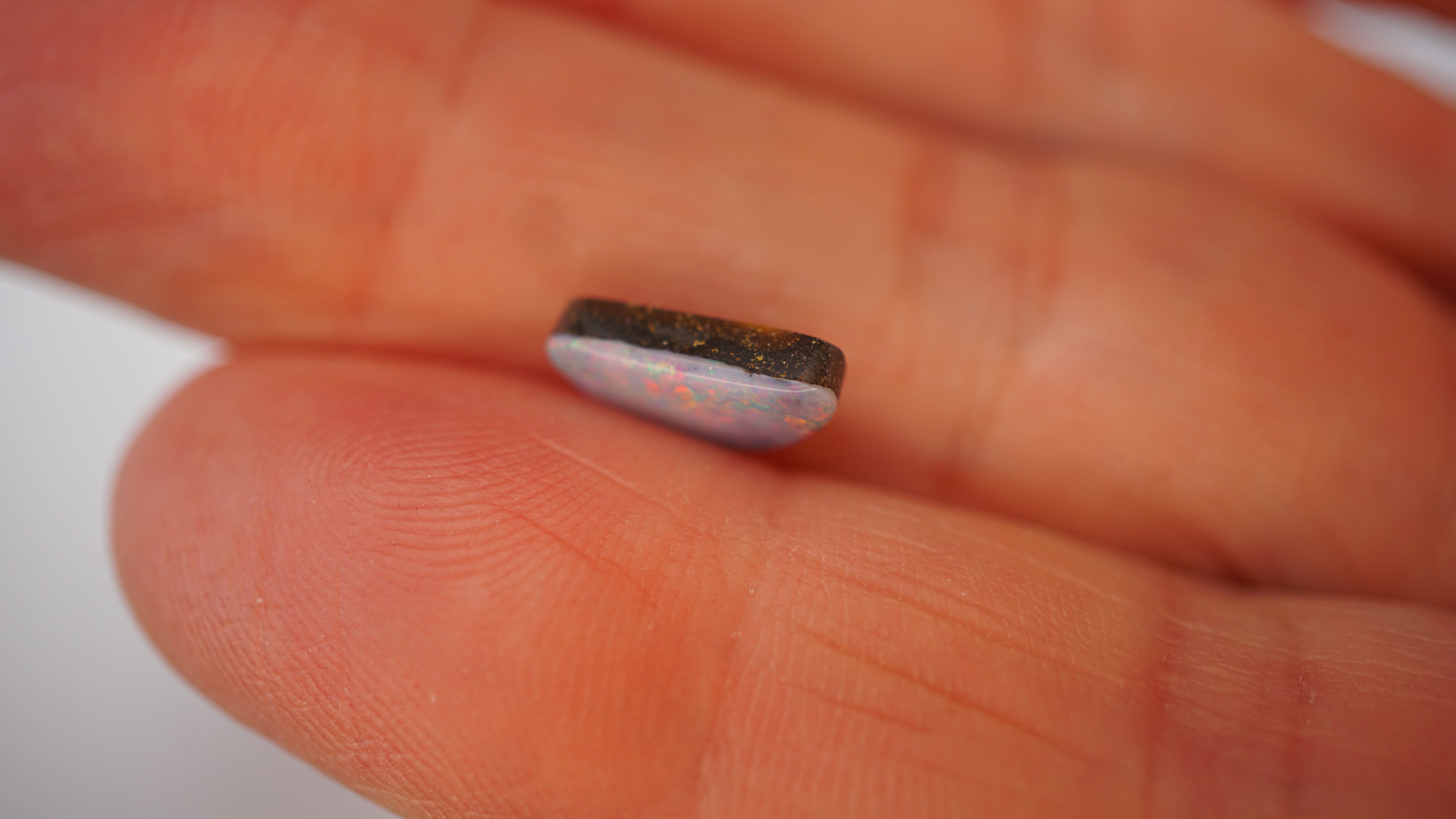 1.8 ct White Boulder Opal - Pink Pinfire Coverage