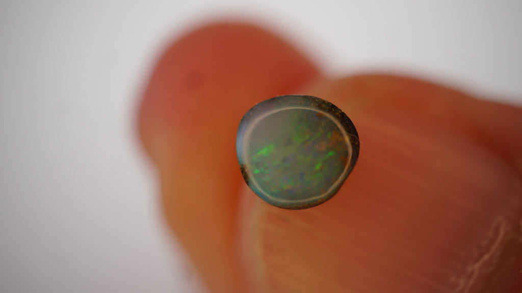 0.7ct Boulder Opal - Green & Pink Play on Pale Green Host Body Tone