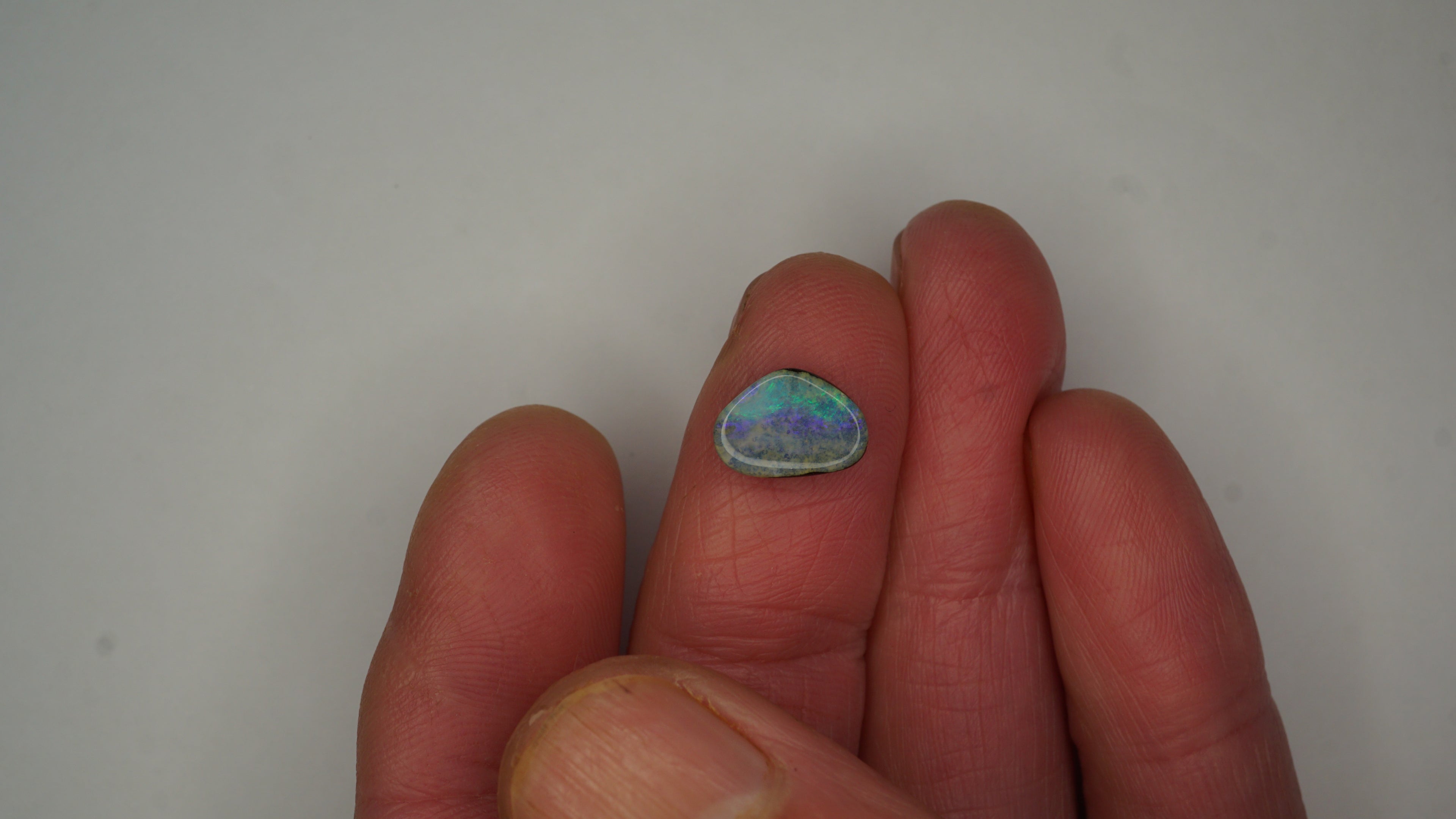 2.6ct Boulder Opal - Bright Green Pinfire on Misty Purple Host Body Tone