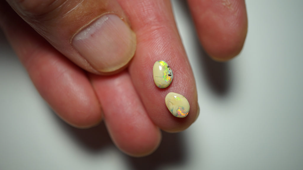 2.3ct Matched Boulder Opal Pair - Green & Aqua Play with Blue and Yellow Highlights on Brown Host Body Tone