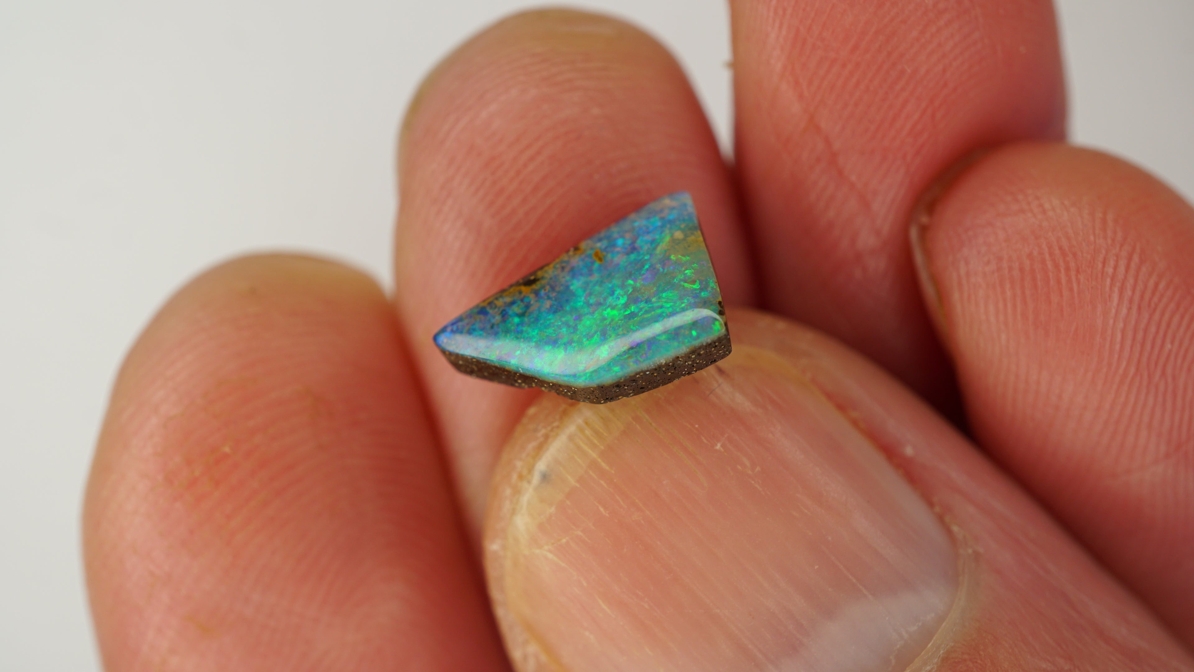 2.0ct Boulder Opal - Electric Green & Blue Pinfire on Green Host Body Tone