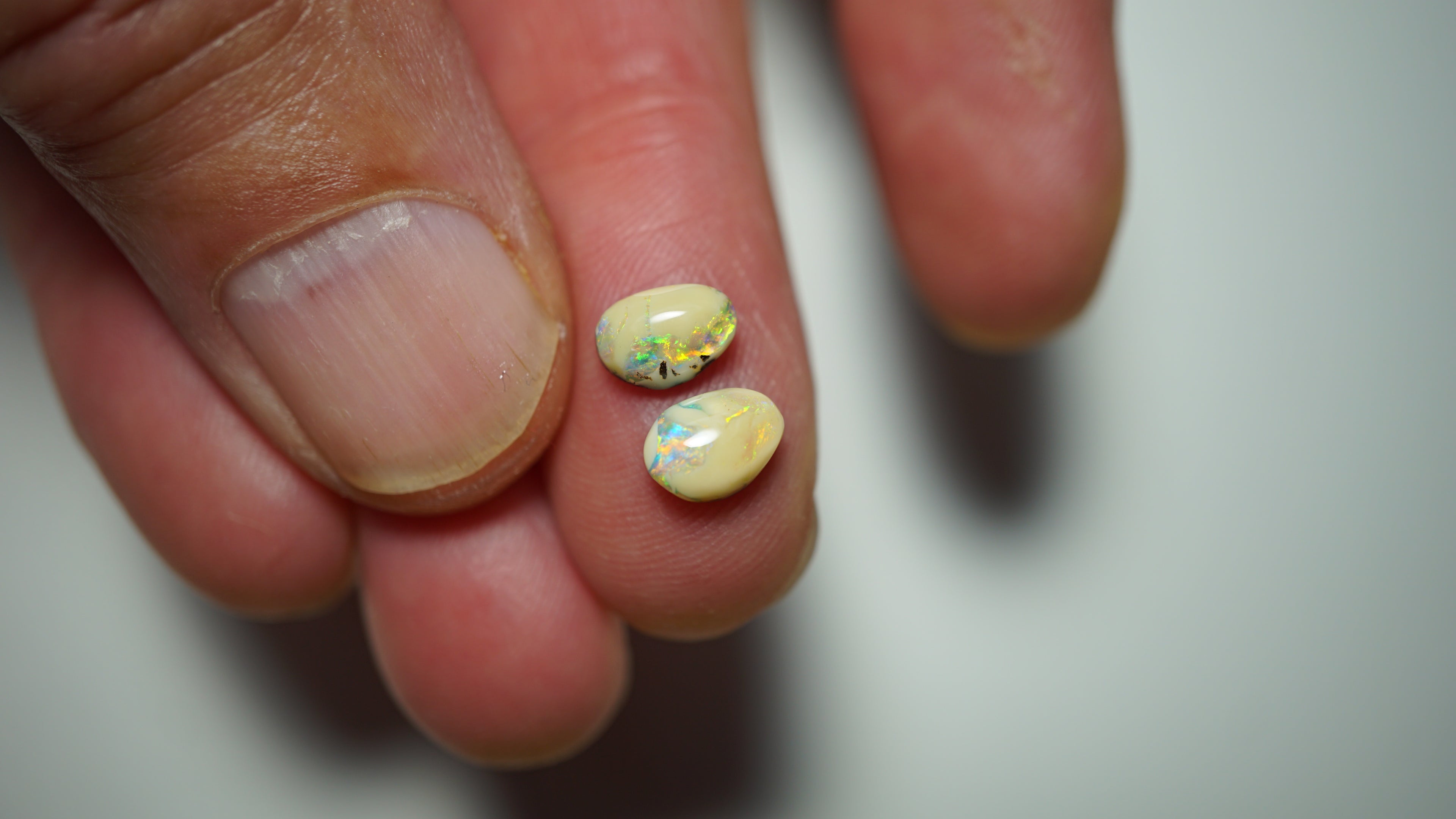 2.3ct Boulder Opal Pair - Green & Aqua Flash on Natural Ironstone