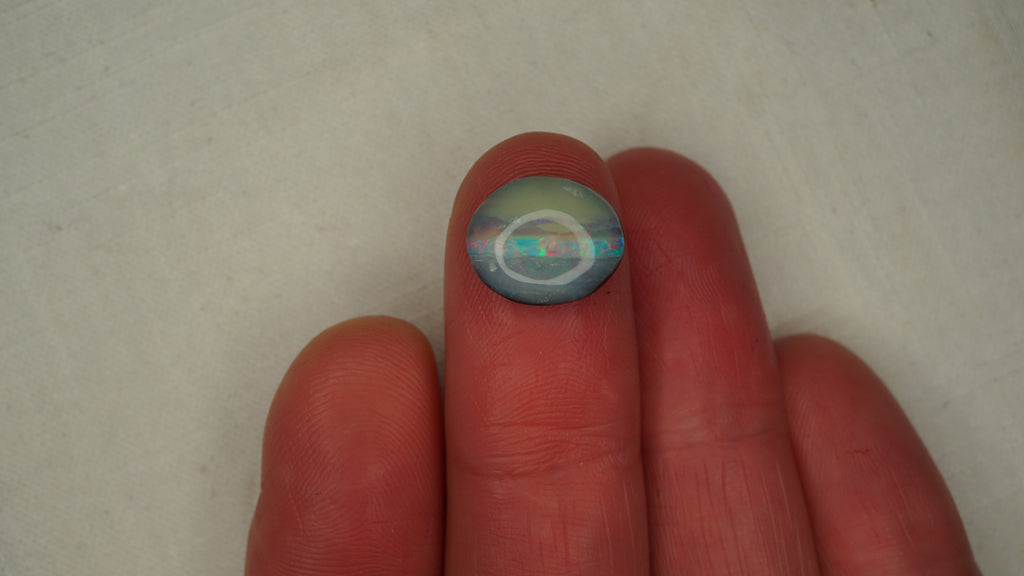 4.0ct Boulder Opal - Cat-Eye Effect with Green & Gold Play on Dark Host Body Tone