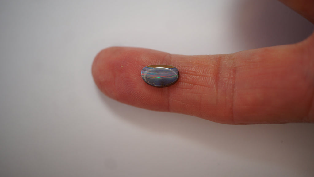 2.1ct Boulder Opal - Crimson & Green Play on Purple Host Body Tone