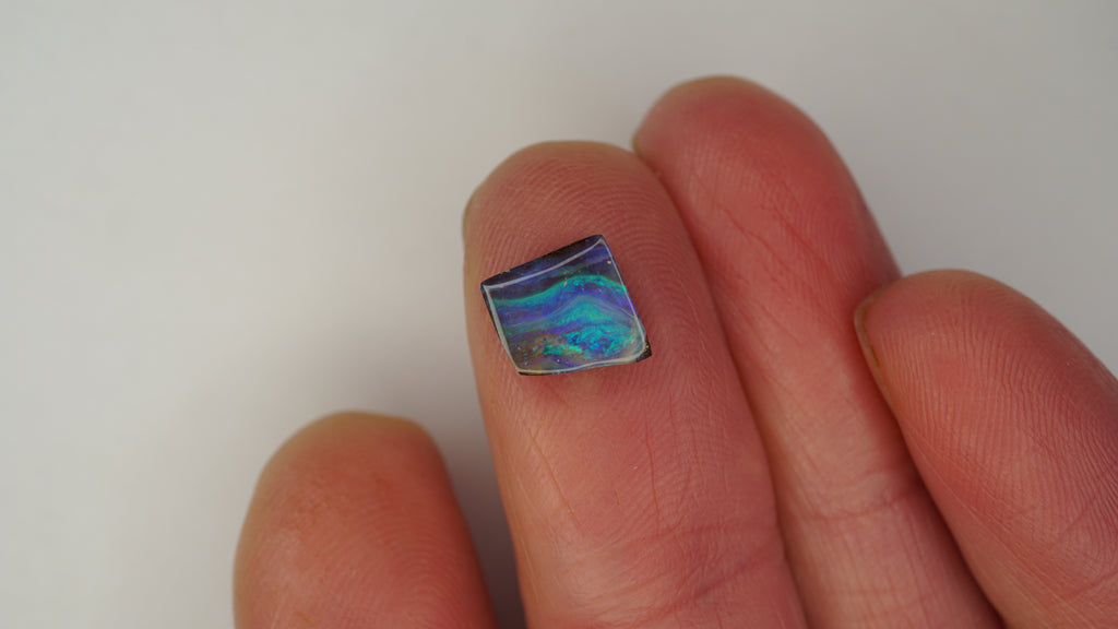 2.1ct Boulder Opal - Green & Purple Bars on Blue Host Body Tone