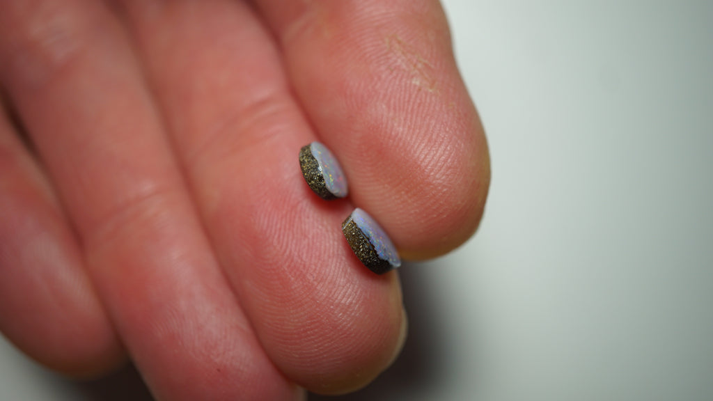 2.45ct Matched Boulder Opal Pair - Magenta & Green Pinfire on Pale Purple Host Body Tone