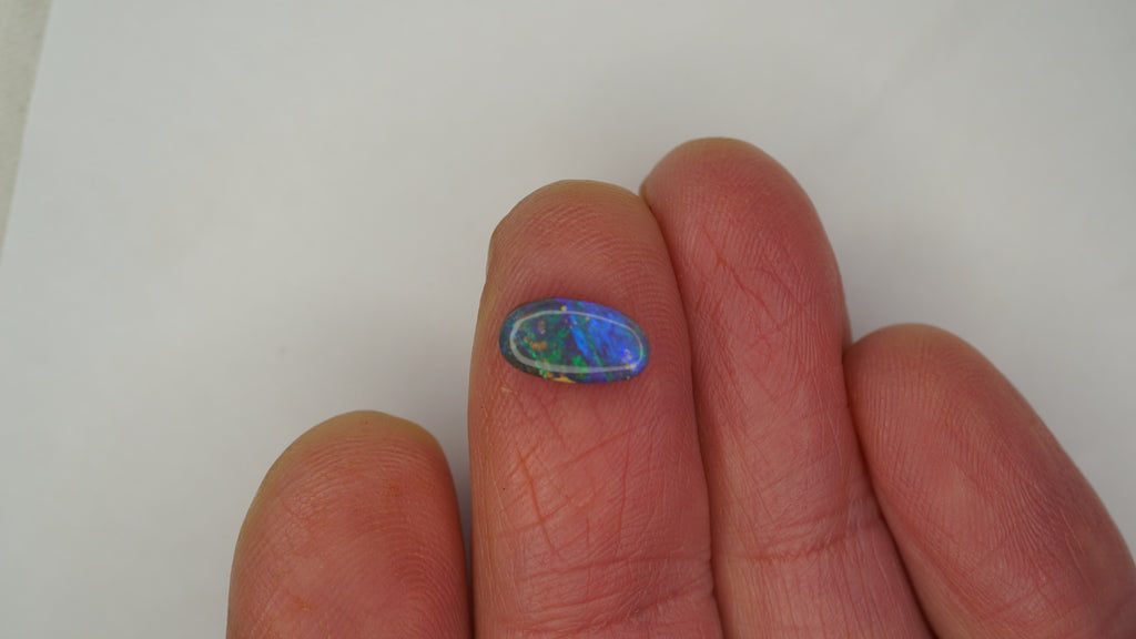 1.3ct Boulder Opal - Electric Green & Blue Fire on Blue Host Body Tone