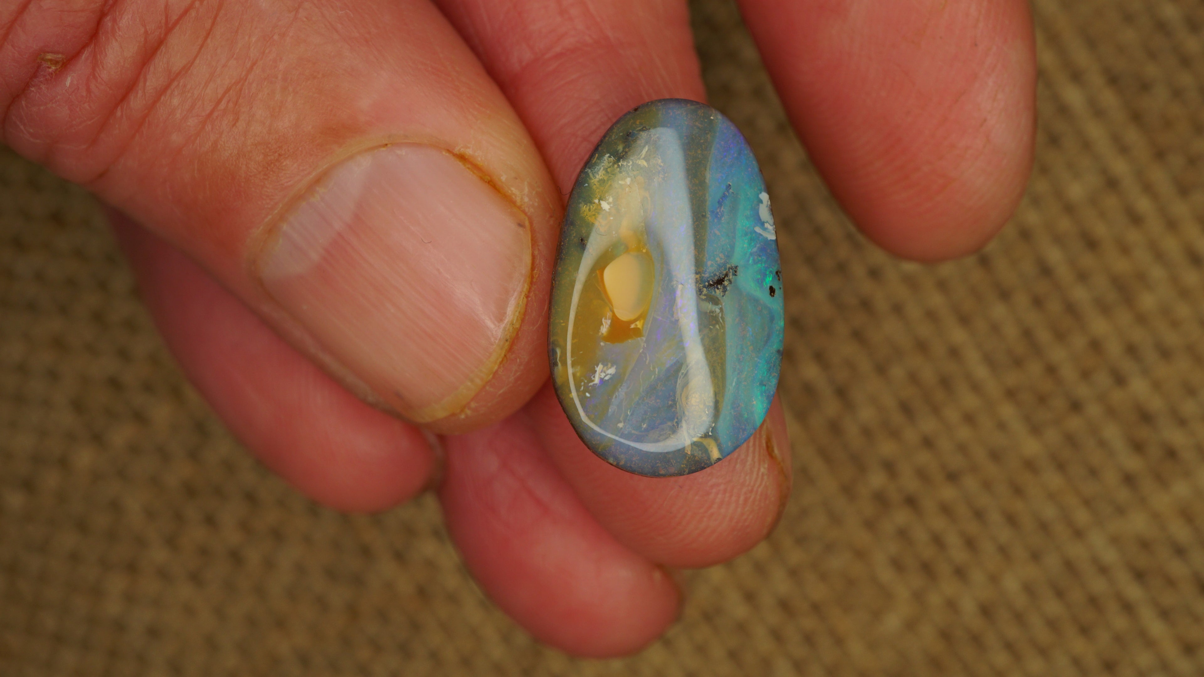 8.8ct Boulder Opal - Blue-Green Play with Light Purple Band on Natural Host Body Tone - Polished Boulder Opal (8.8ct)