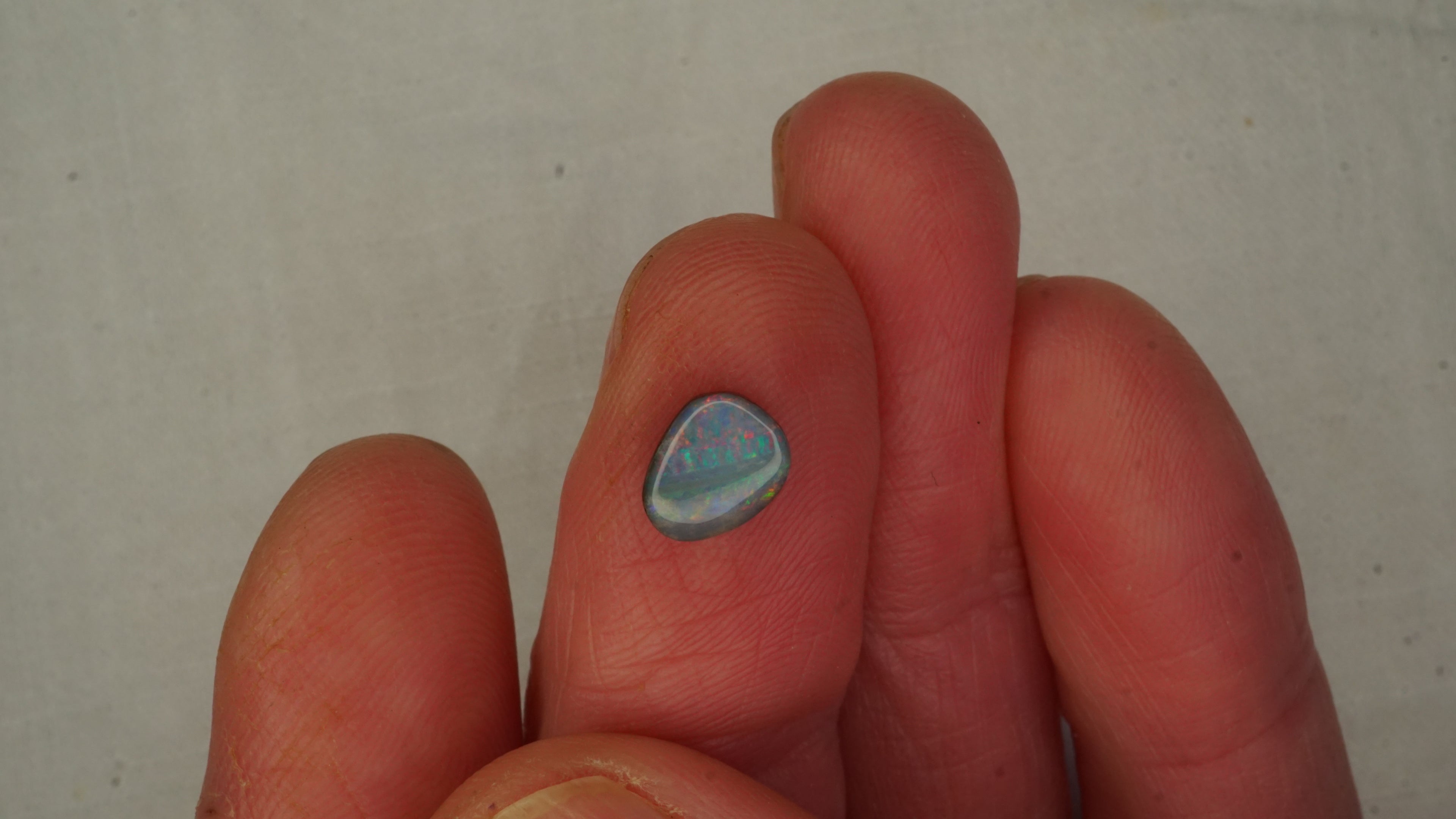 Twilight Flame Boulder Opal - Light Blue with Streaky Red & Green Play