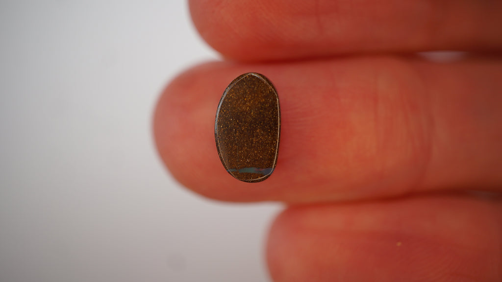 2.1ct Boulder Opal - Crimson & Green Play on Purple Host Body Tone