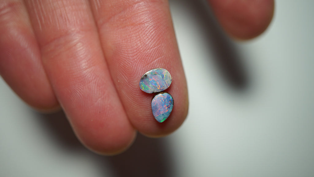 1.3ct Matched Boulder Opal Pair - Magenta & Green Pinfire on Lavender Host Body Tone