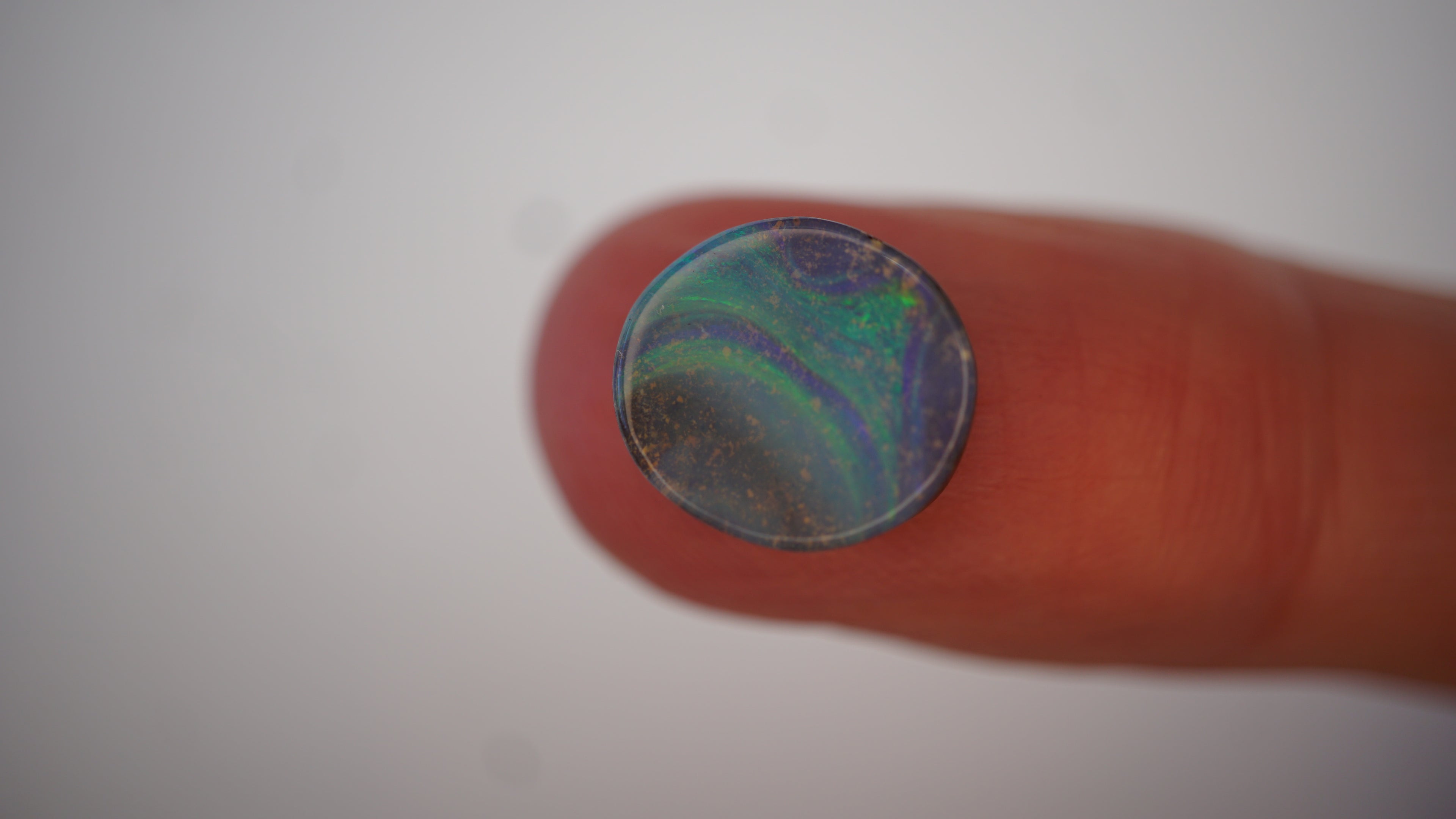 3.9 ct Blue Boulder Opal - Green Feature Flash