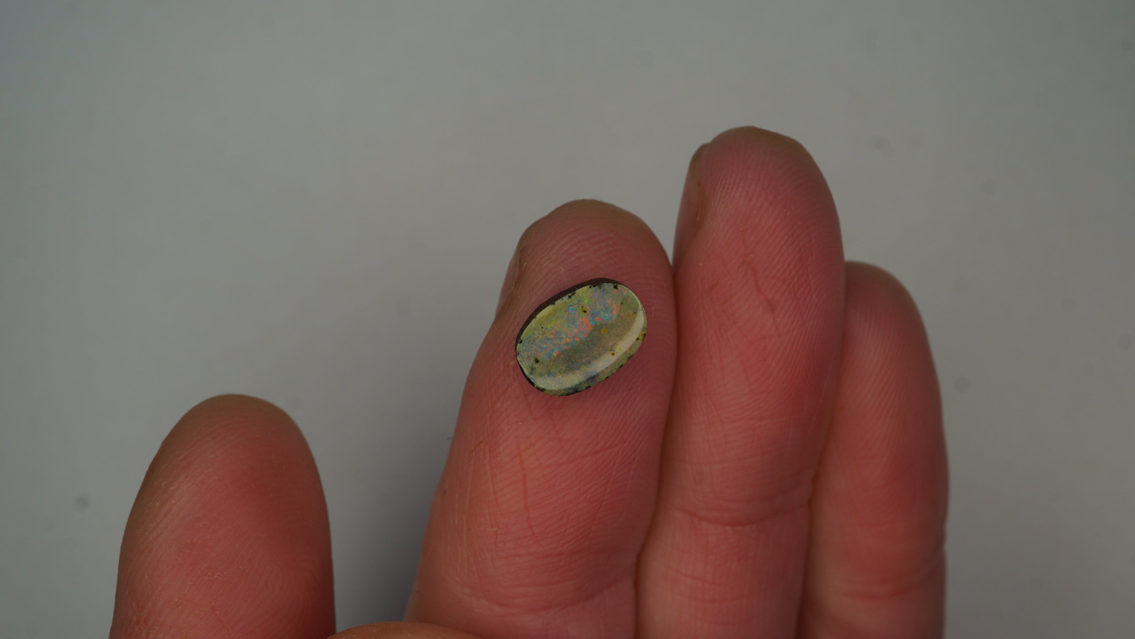 1.6ct Boulder Opal - Green & Blue Play on Warm Host Body Tone