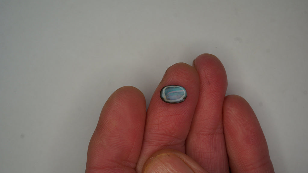 1.9ct Boulder Opal - Pink, Green & Red Pinfire on Blue-Green Host Body Tone