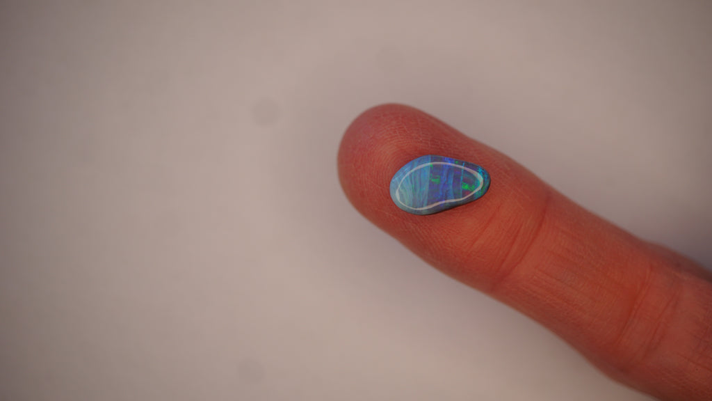2.3ct Boulder Opal - Crimson, Blue & Green Bands on Blue Host Body Tone