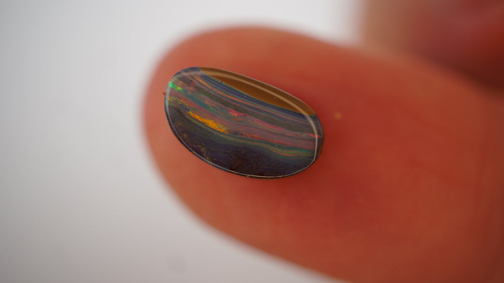 2.1ct Boulder Opal - Crimson & Green Play on Purple Host Body Tone