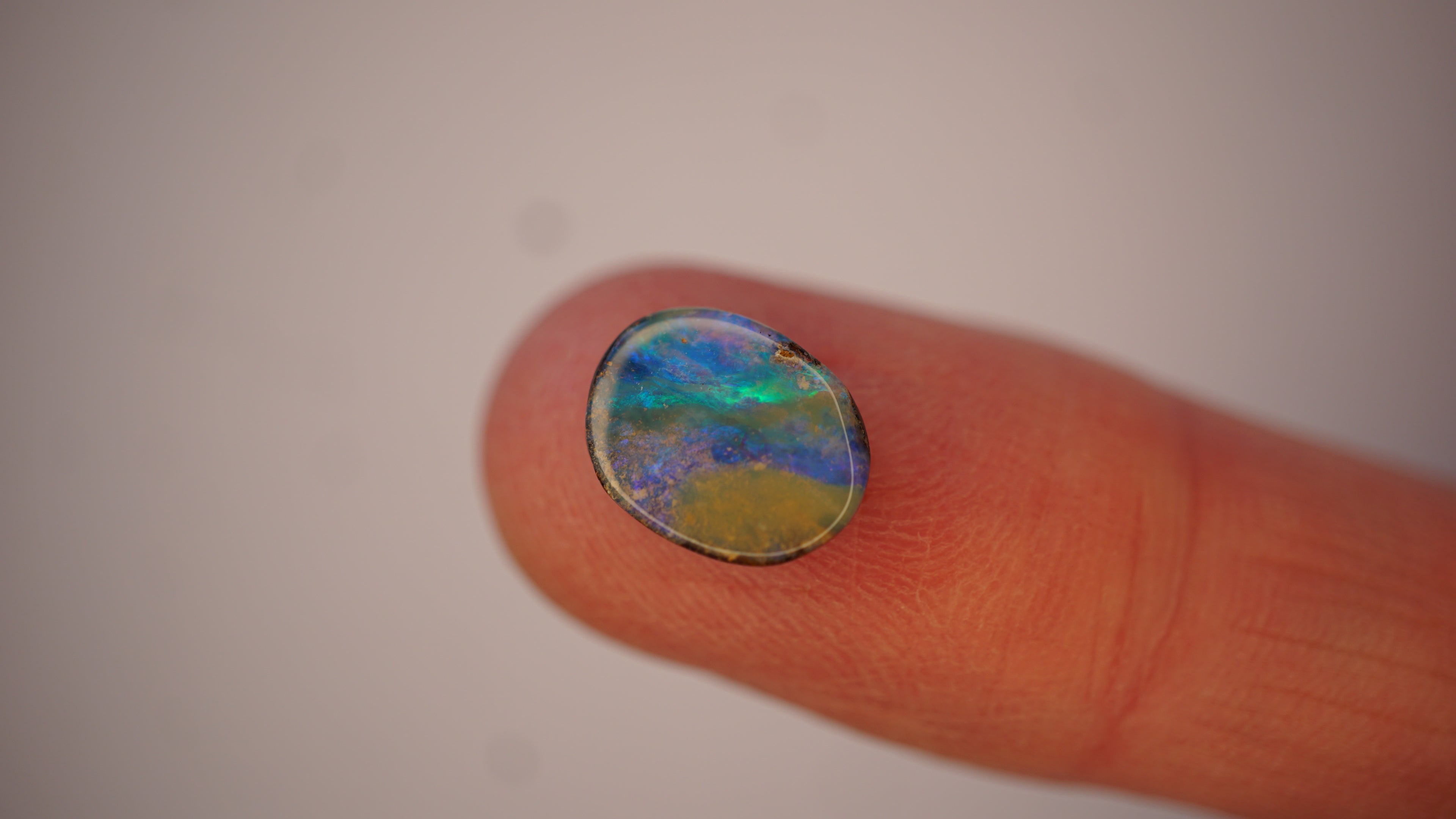 2.5ct Boulder Opal - Electric Green Sash on Blue Base