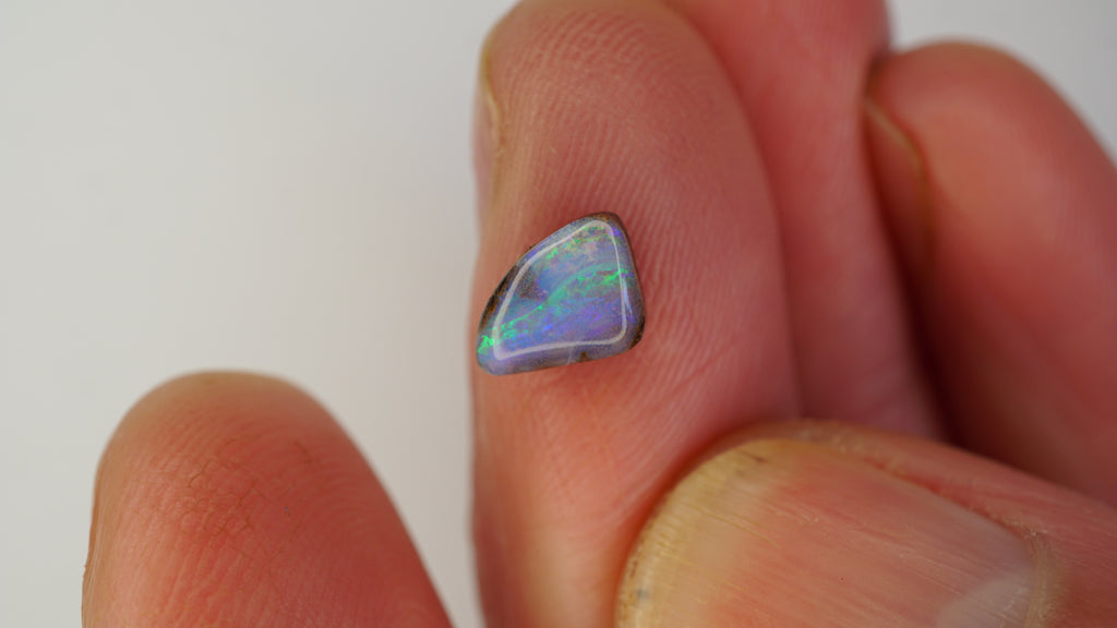 Aurora Flow Boulder Opal - Purple with Bright Green Play