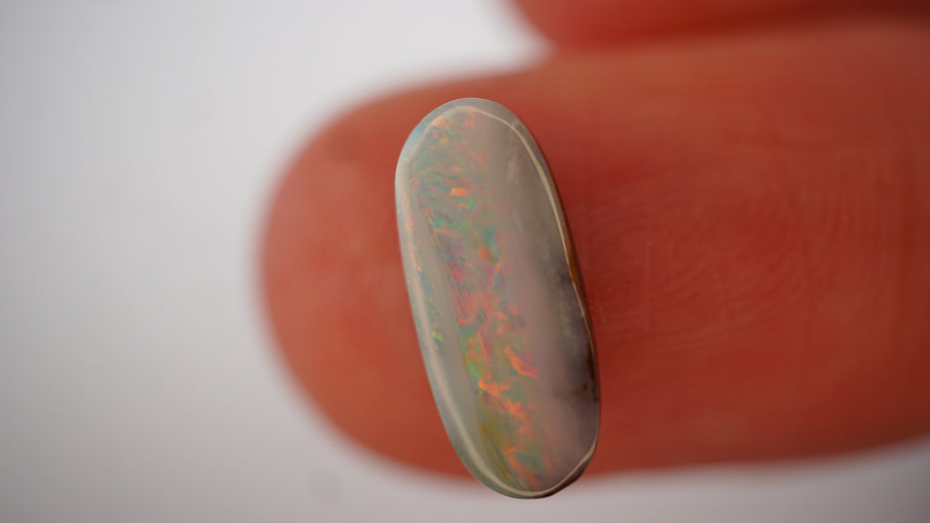 1.3ct Boulder Opal - Pink & Green Pinfire on White Host Body Tone