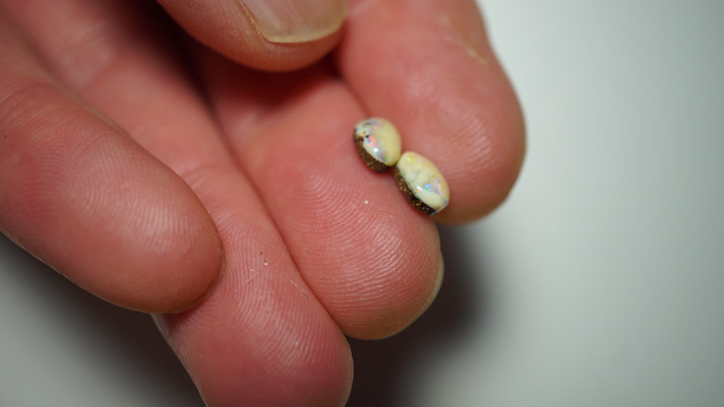 2.3ct Matched Boulder Opal Pair - Green & Aqua Play with Blue and Yellow Highlights on Brown Host Body Tone