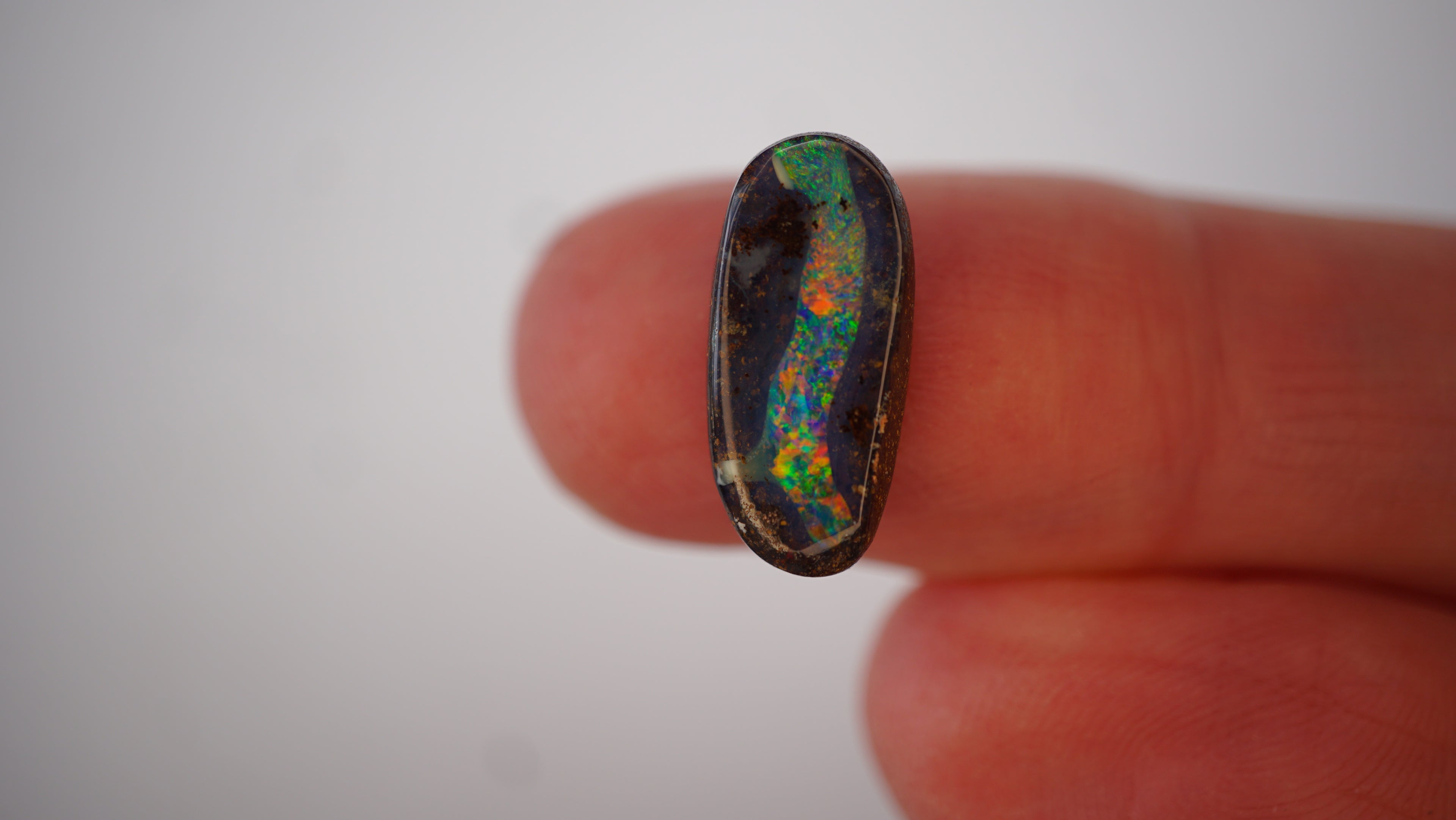 3.6 ct Boulder Opal - Multicolour Pinfire Ribbon in Clear Opal