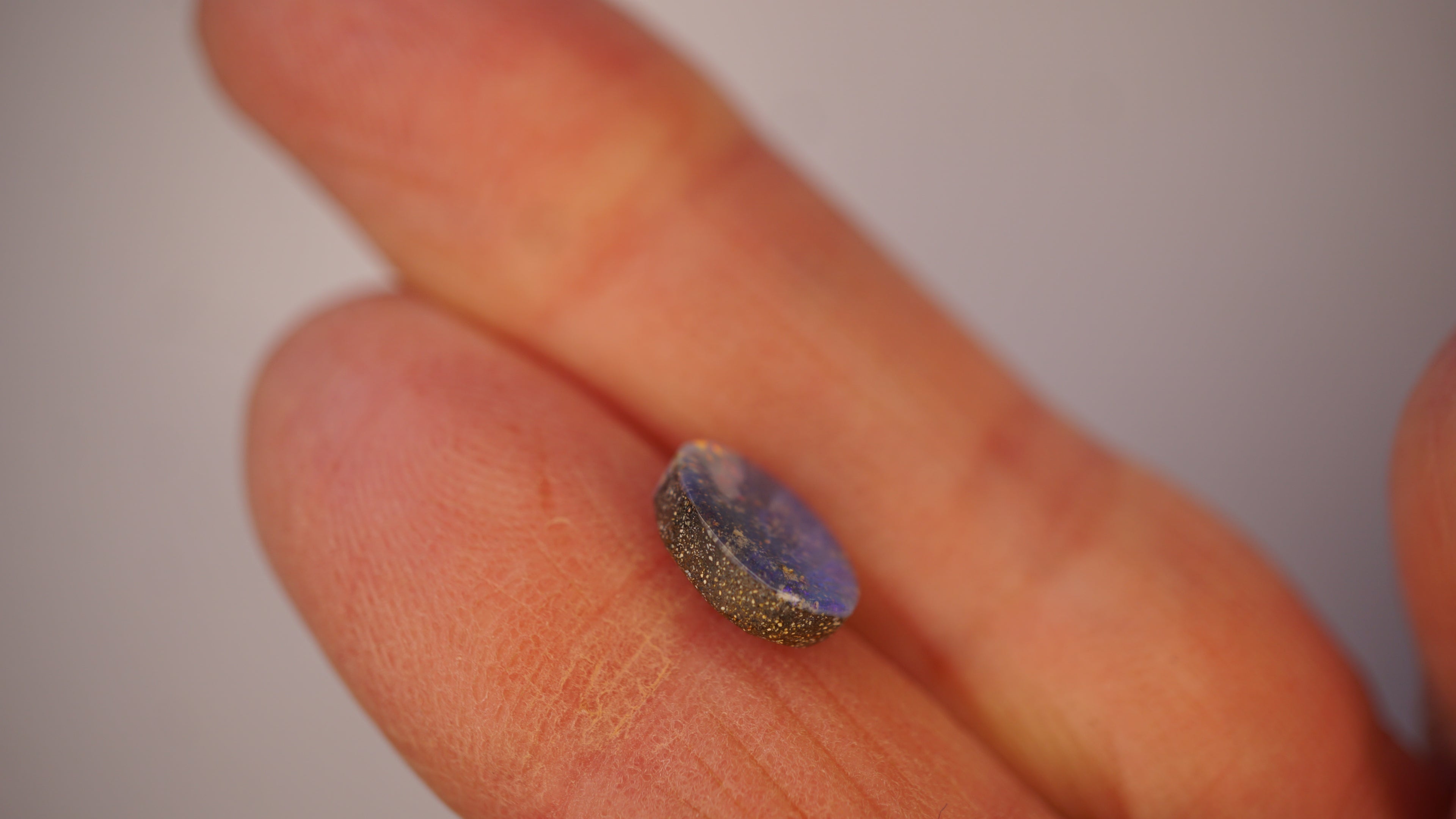 2.3ct Boulder Opal - Crimson & Green Play on Sky Blue Host Body Tone