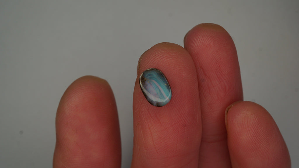 1.9ct Boulder Opal - Pink, Green & Red Pinfire on Blue-Green Host Body Tone