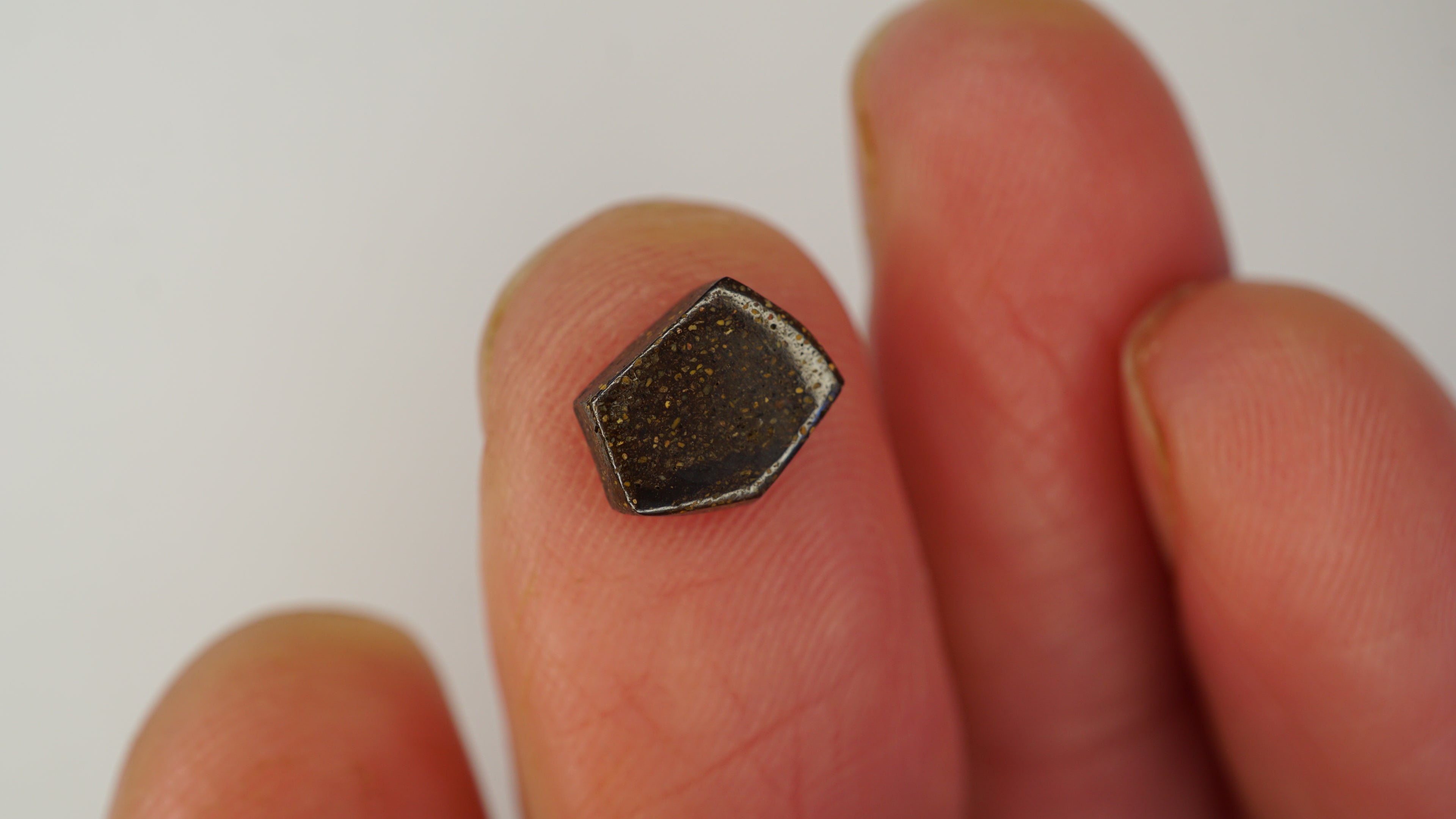 1.6ct Pentagonal Boulder Opal - Red Pinfire on Light Purple Base