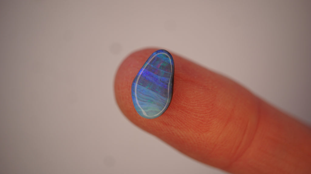 2.3ct Boulder Opal - Crimson, Blue & Green Bands on Blue Host Body Tone