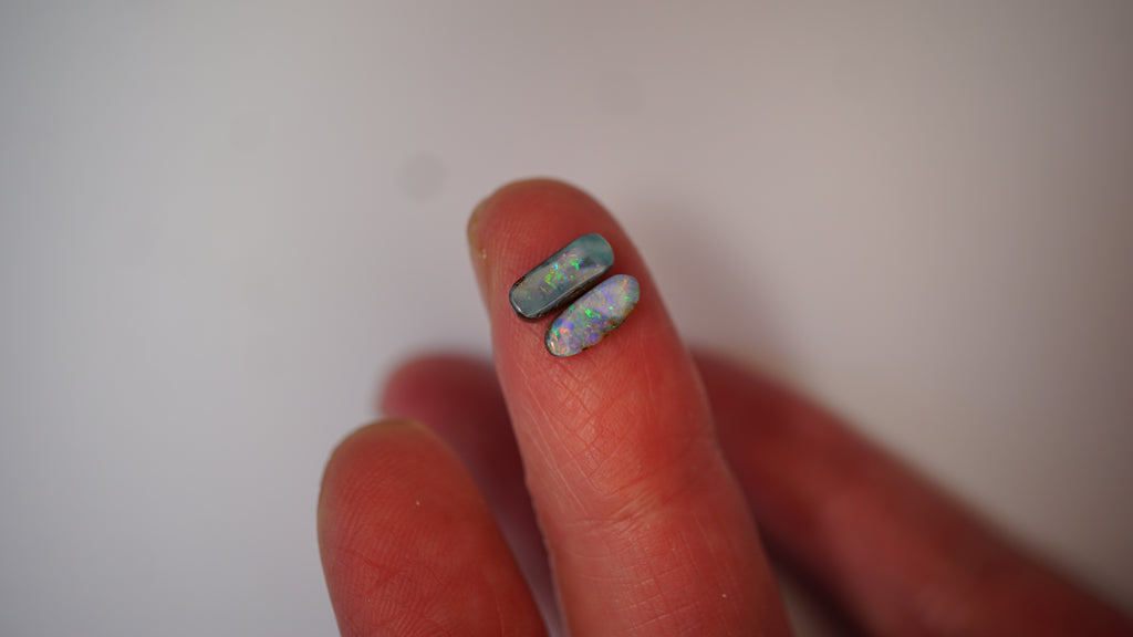 2.09ct Matched Boulder Opal Pair - Green & Violet Play on Sky Blue Host Body Tone