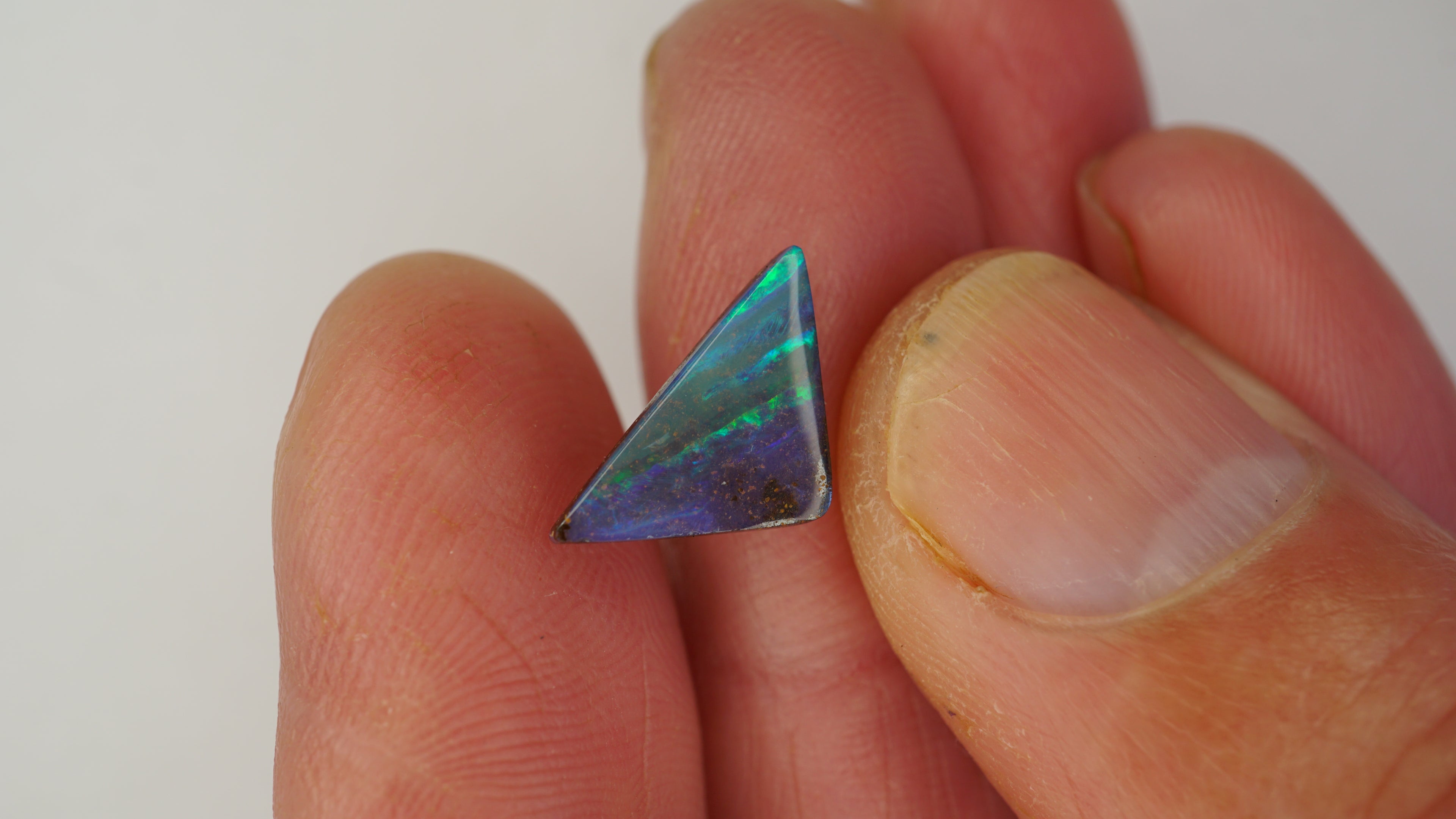 2.8 ct Triangular Blue Boulder Opal - Green Linear Colour Play