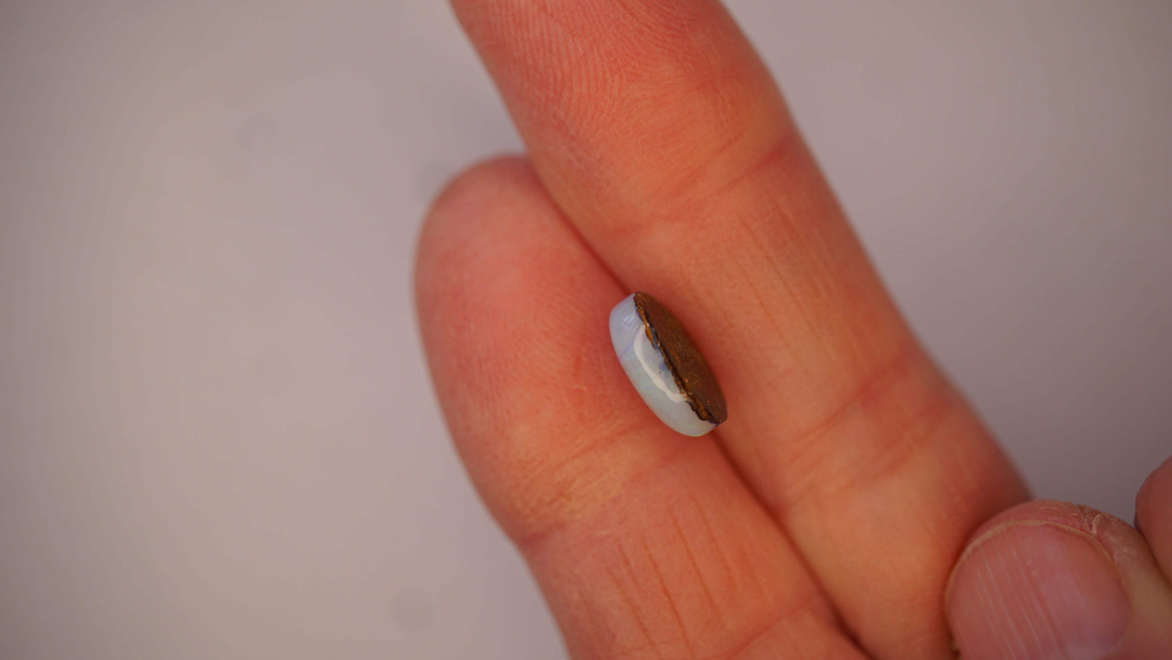 2.7ct Boulder Opal - Bright Green Streak on Pale Blue Host Body Tone