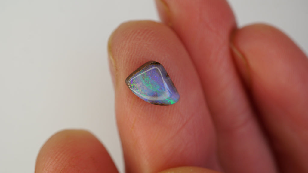 1.3ct Boulder Opal - Bright Green Play on Purple Host Body Tone