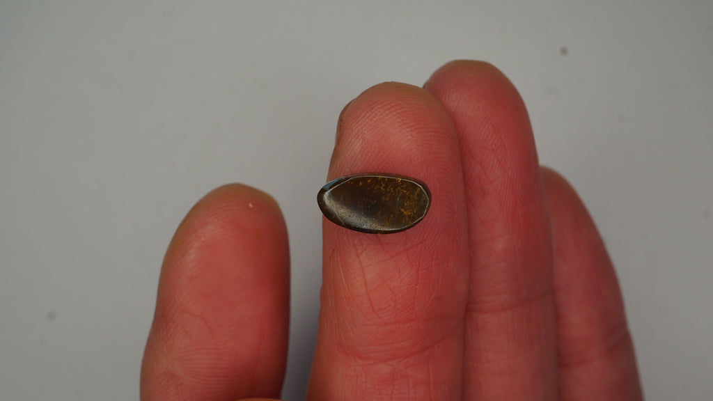 2.6ct Boulder Opal - Green, Blue & Crimson Play on Pale Purple Host Body Tone