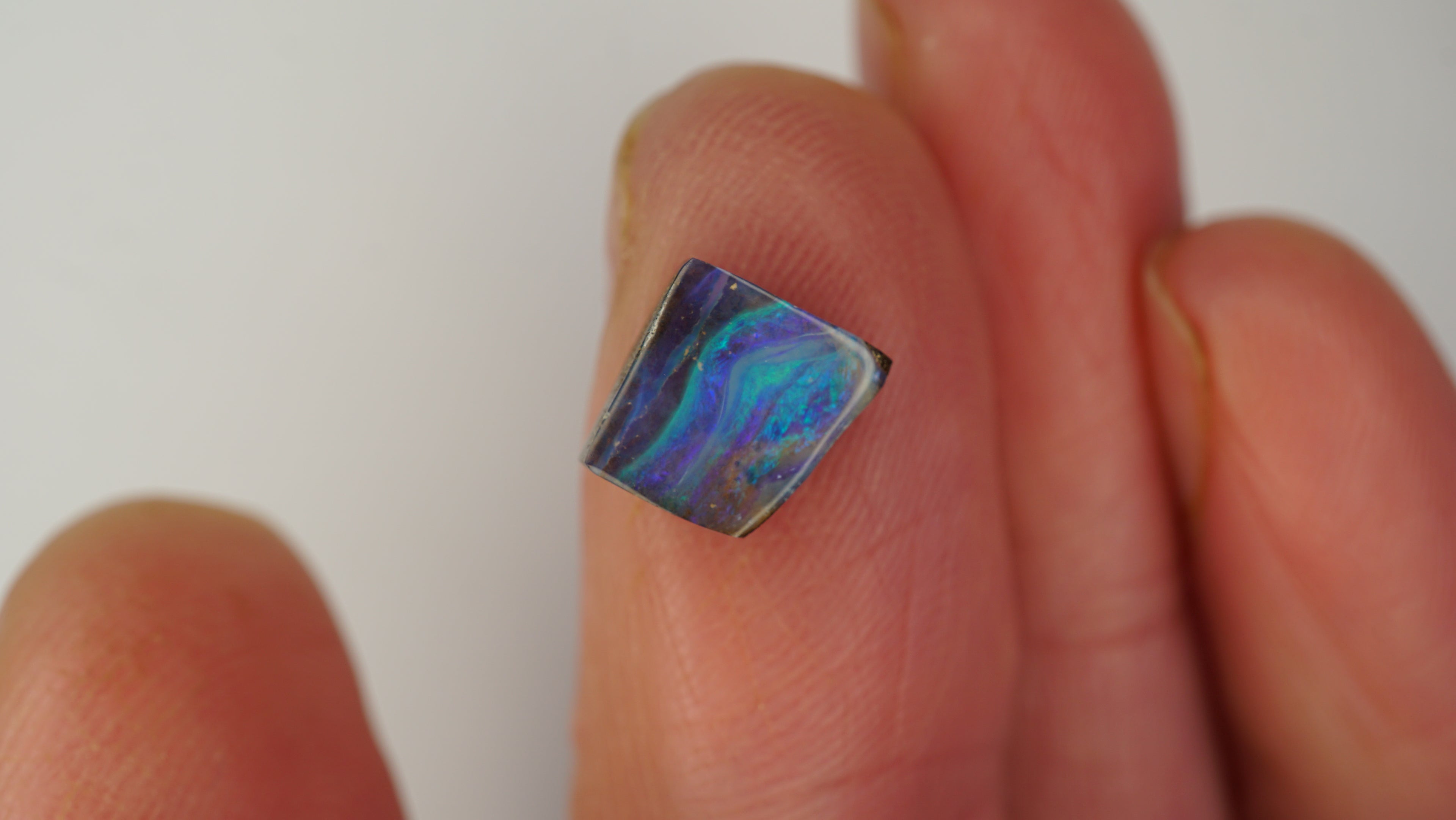 2.1ct Boulder Opal - Green & Purple Bars on Blue Host Body Tone
