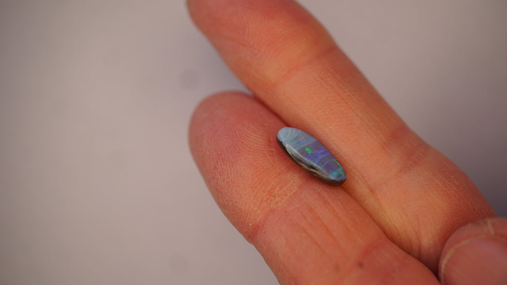 2.3ct Boulder Opal - Crimson, Blue & Green Bands on Blue Host Body Tone