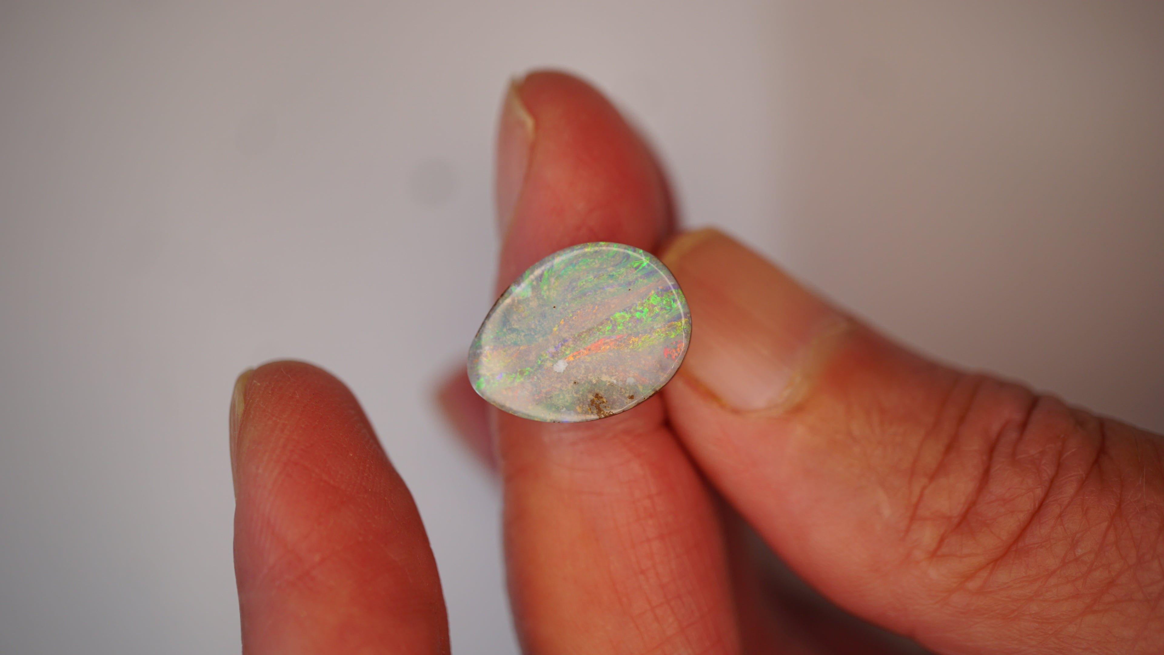 10.3ct Boulder Opal - Streaks of Pink, Gold & Green Pinfire on Light Green Host Body Tone