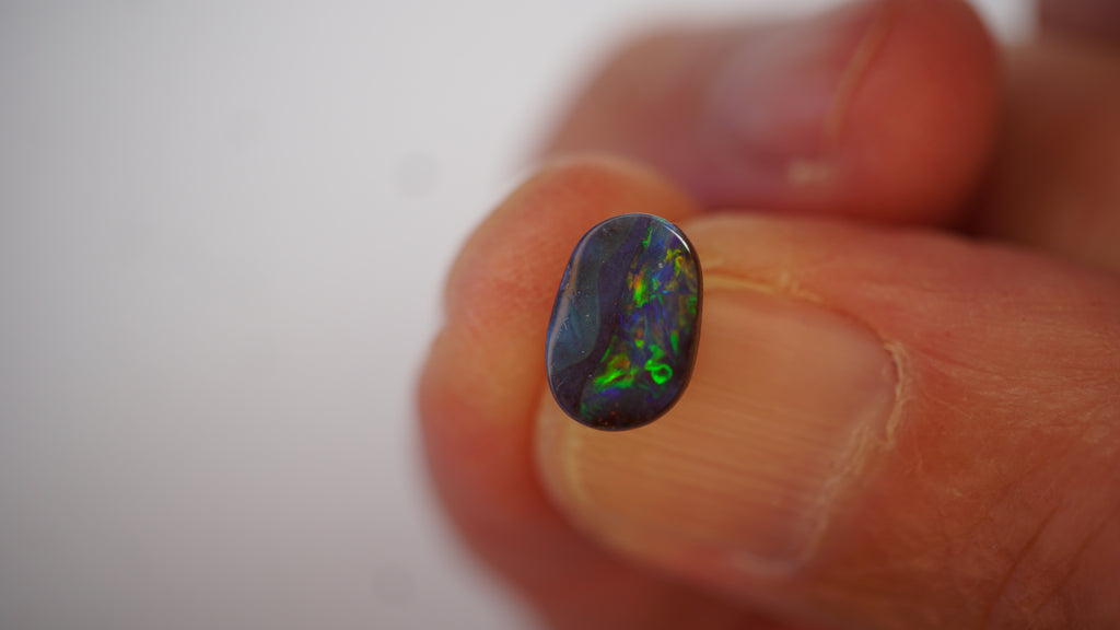1.3ct Boulder Opal - Neon Green Fire on Deep Blue Base