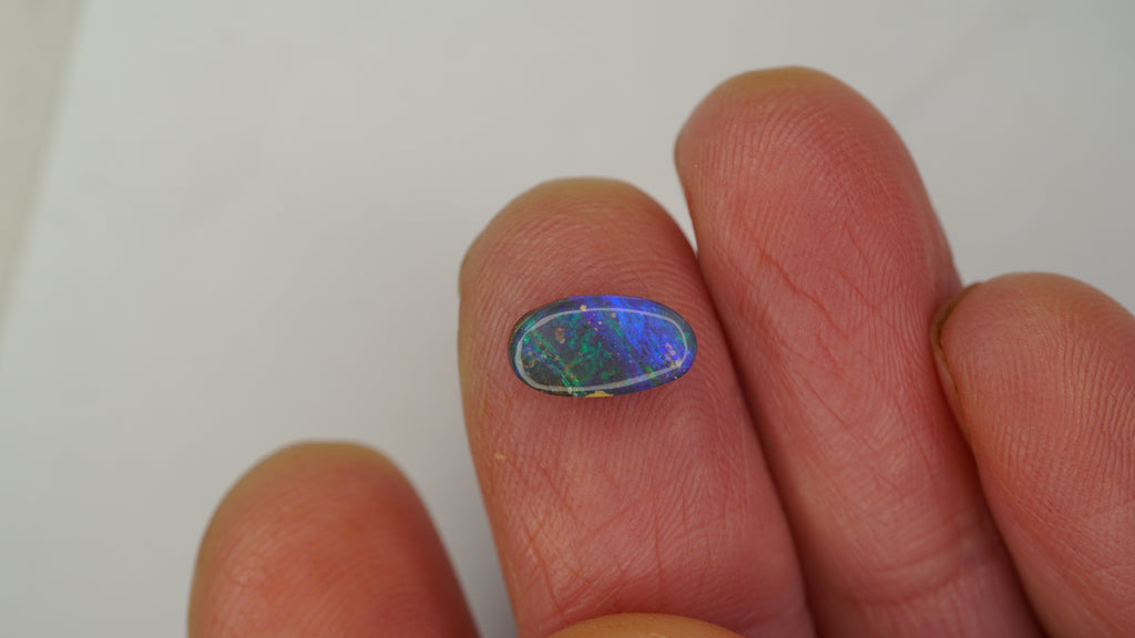 1.3ct Boulder Opal - Electric Green & Blue Fire on Blue Host Body Tone