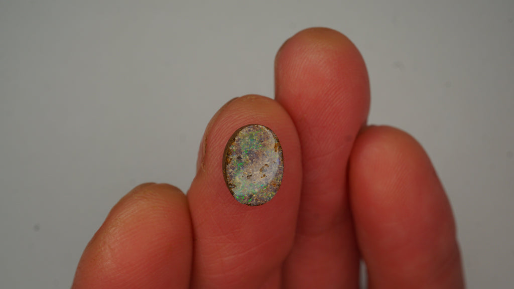 Twilight Spark Boulder Opal - Purple with Green Pinfire & Inclusions