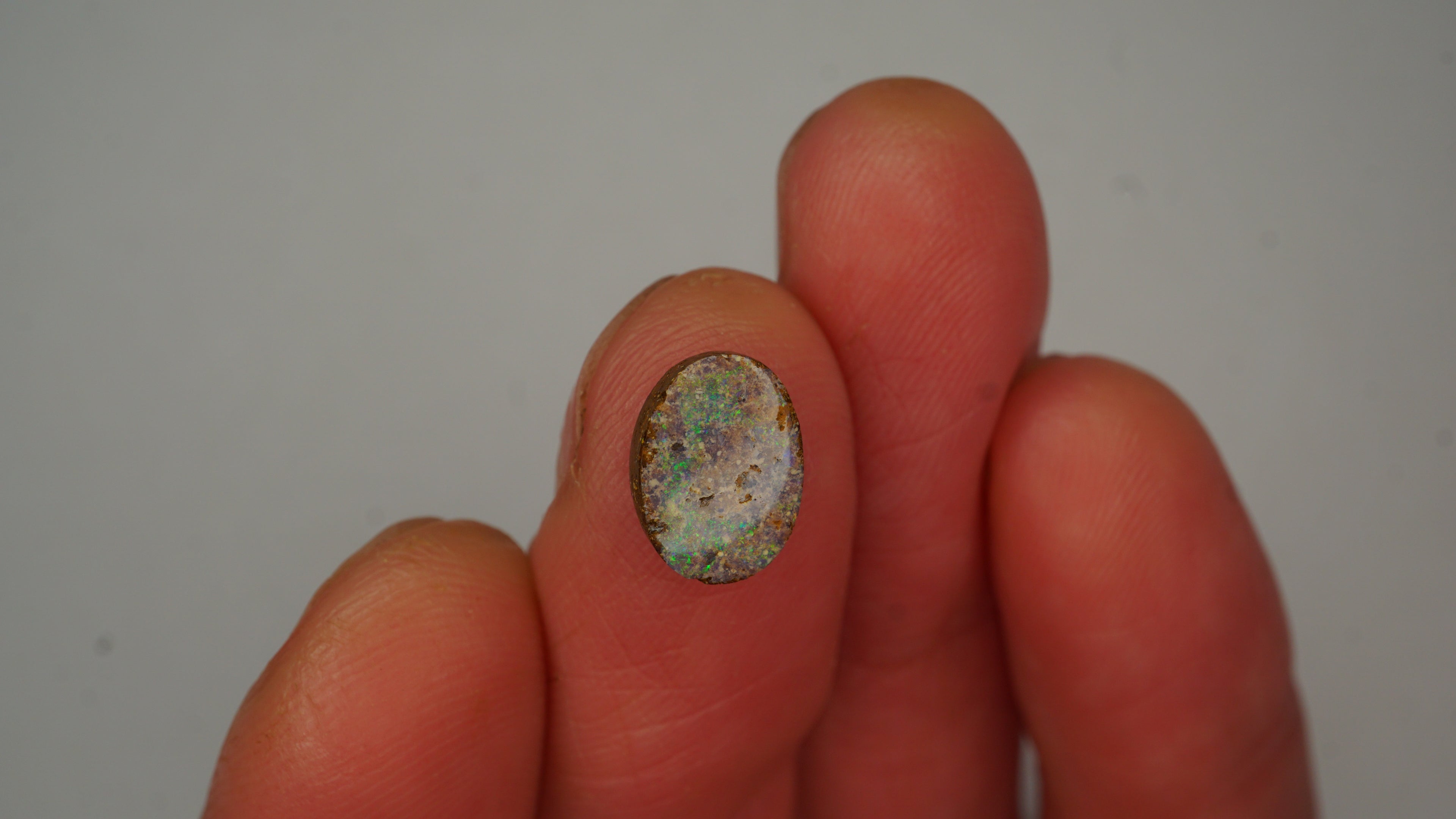 Twilight Spark Boulder Opal - Purple with Green Pinfire & Inclusions