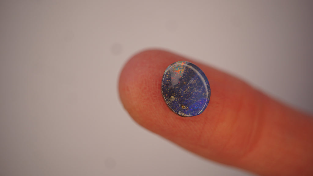 2.3ct Boulder Opal - Crimson & Green Play on Sky Blue Host Body Tone